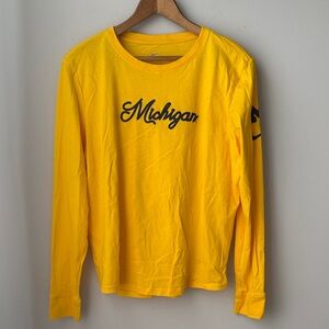 The Nike Tee Women’s Long Sleeve University of Michigan Crew Neck Shirt